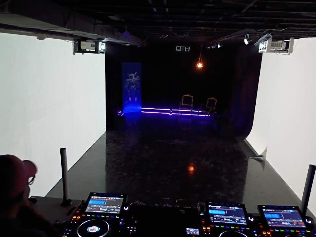 Purple and blue lit interior venue for The True and Live Series